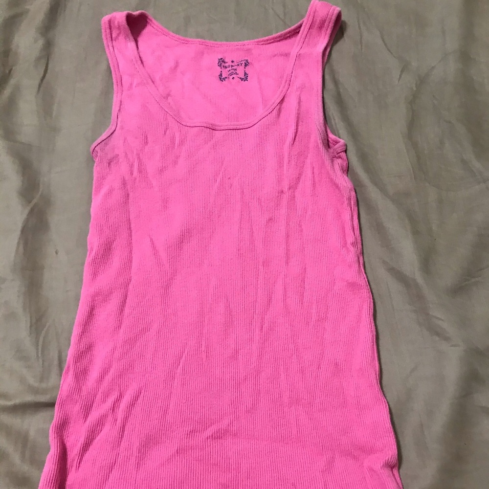 2 pink, 1 purple tank tops